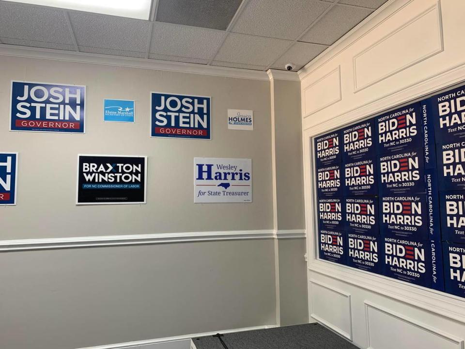 Biden-Harris campaign signs hang on the wall alongside statewide and local Democratic candidates at the Mecklenburg Democrats headquarters in uptown Charlotte, where the Biden-Harris campaigned opened a field office in early April.