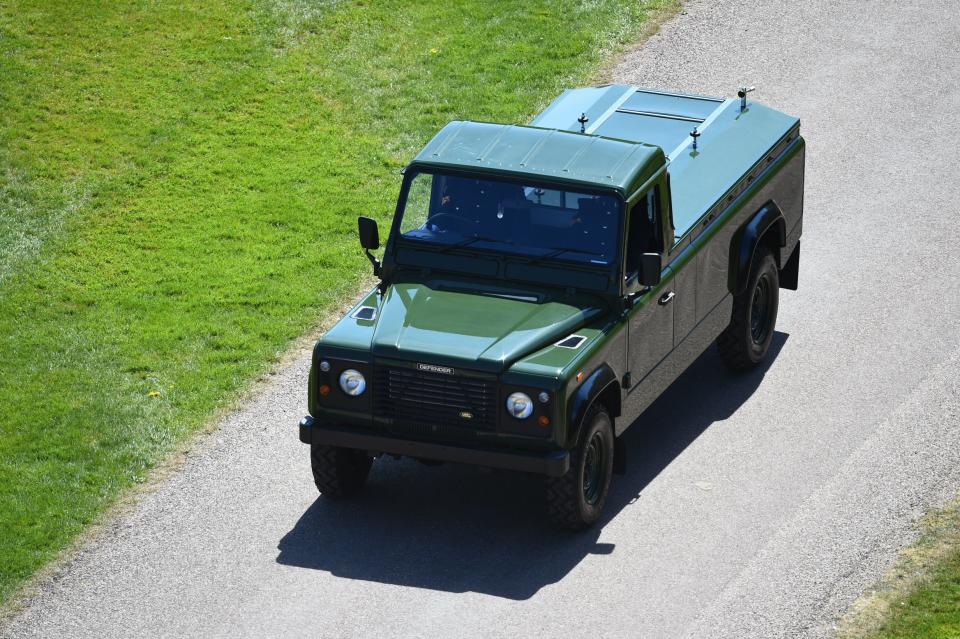 The hearse, a specially modified Land Rover, arrives at Windsor CastlePA