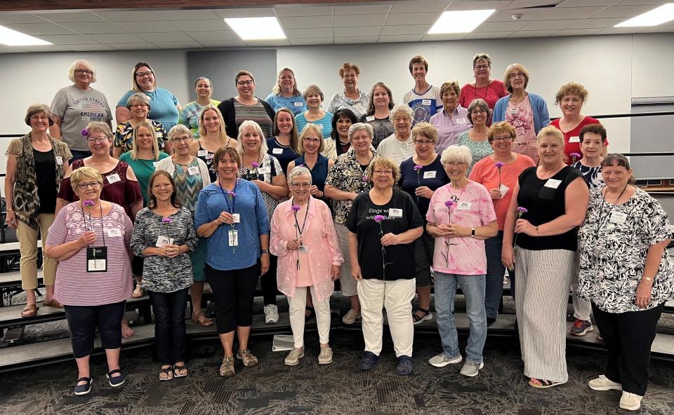 The Metro Mix Chorus welcomed some new Sweet Adelines as members, shown in the front two rows.