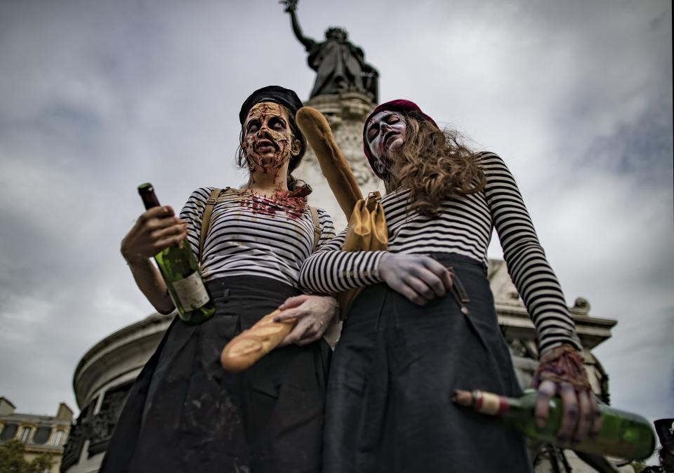 <p>People in costume take part in a walk for World Zombie Day 2017, on Place de la République in Paris, France, Oct. 7, 2017. (Photo: EFE/EPA/IAN LANGSDON) </p>