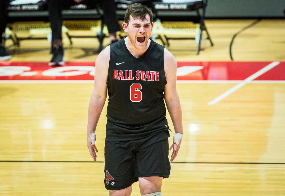 Ball State's Colin Ensalaco celebrates a point against Lewis during their game at Worthen Arena Wednesday, April 20, 2022. 