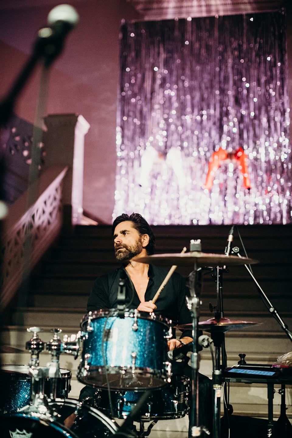 John Stamos on drums.