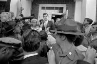 Sen. Edward Kennedy escorts wife, Joan, through crowd of newsmen to Dukes County Court House for start of inquest into the death of Mary Jo Kopechne in Edgartown, Mass., on Jan. 5, 1970. (Photo: Bettmann/Getty Images)