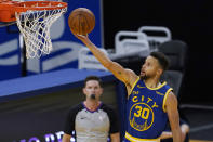 Golden State Warriors guard Stephen Curry (30) shoots against the New York Knicks during the first half of an NBA basketball game in San Francisco, Thursday, Jan. 21, 2021. (AP Photo/Jeff Chiu)