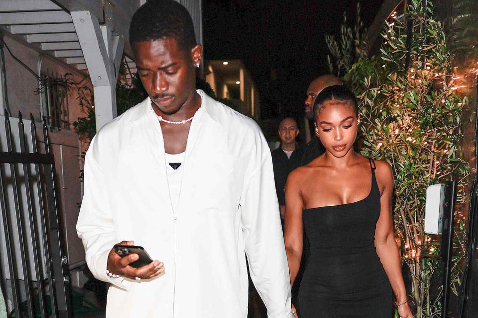 <p>Rachpoot/Bauer-Griffin/GC Images</p> Damson Idris and Lori Harvey look stylish during a night out together in Santa Monica, California.