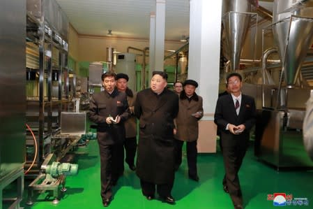 FILE PHOTO: North Korean leader Kim Jong Un inspects a factory in Samjiyon County, North Korea