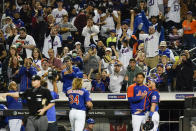 Fans cheer for New York Mets starting pitcher Noah Syndergaard as he walks to the dugout during the first inning in the second baseball game of a doubleheader against the Miami Marlins Tuesday, Sept. 28, 2021, in New York. (AP Photo/Frank Franklin II)