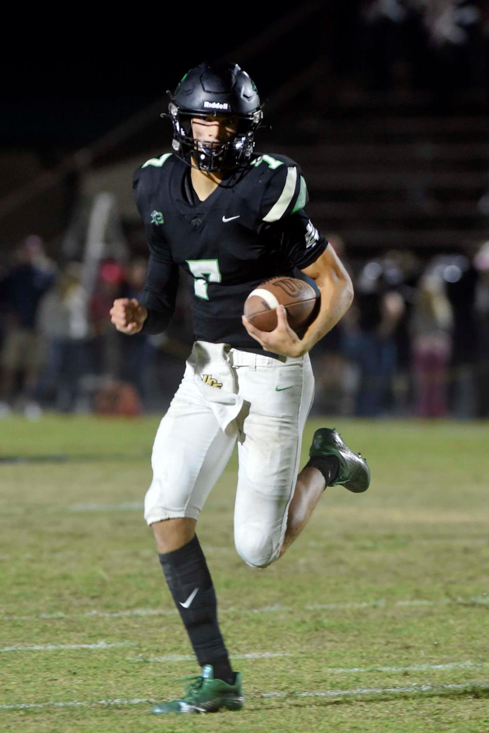 Choctawhatchee High School's Jesse Winslette runs the ball against Fort Walton Beach High School during a game at Etheredge Stadium on Friday, Oct. 28, 2022.