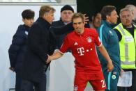 Football Soccer - VFL Wolfsburg v Bayern Munich - Bundesliga - Volkswagen Arena, Wolfsburg, Germany - 29/4/17 Bayern Munich's Philipp Lahm shakes hands with VfL Wolfsburg coach Andries Jonker after being substituted off Reuters / Kai Pfaffenbach Livepic