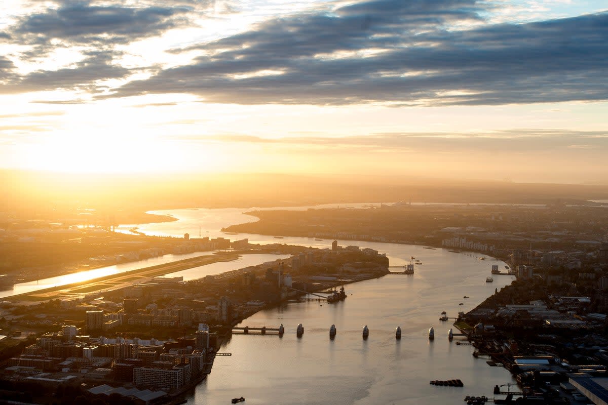 An aerial view of London’s Thames estuary, including the Thames Barrier, during sunrise  (Alamy Stock Photo)