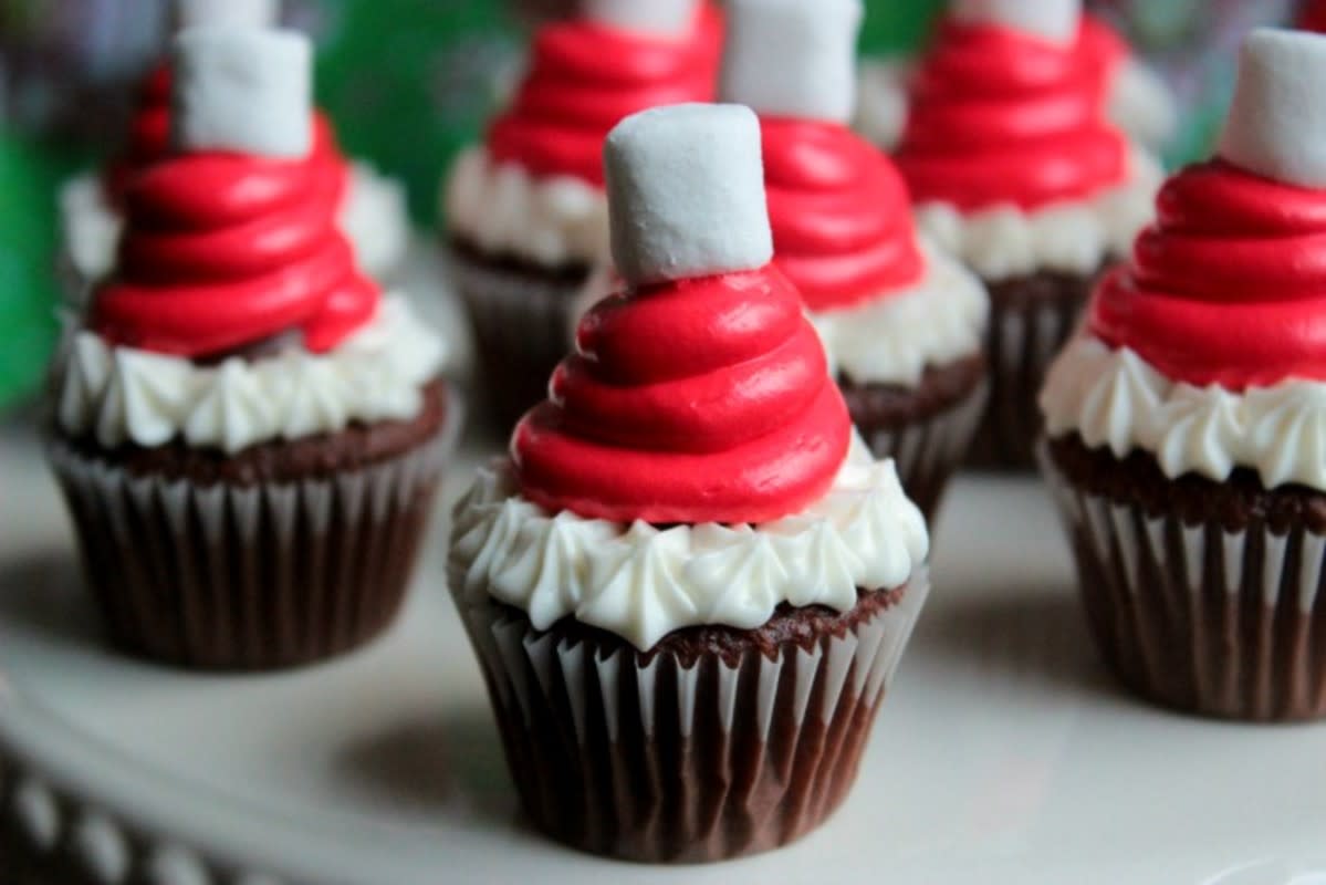 <p>Big Bear's Wife</p><p>These treats are perfect if you are running behind and need a quick Christmas themed treat!</p><p><strong>Get the recipe: <a href="https://www.bigbearswife.com/mini-santa-hat-cupcakes-with-candy-cane/" rel="nofollow noopener" target="_blank" data-ylk="slk:Mini Santa Hat Cupcakes;elm:context_link;itc:0;sec:content-canvas" class="link rapid-noclick-resp">Mini Santa Hat Cupcakes</a></strong></p>