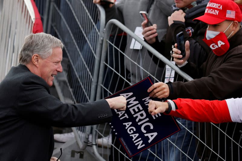 FILE PHOTO: White House Chief of Staff Mark Meadows greets supporters of U.S. President Donald Trump during a campaign rally at Reading Regional Airport in Reading Pennsylvania , U.S.