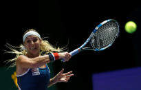 Tennis - Singapore WTA Finals Singles - National Indoor Stadium, Singapore - 23/10/2016 - Dominika Cibulkova of Slovakia in action against Angelique Kerber of Germany. REUTERS/Edgar Su