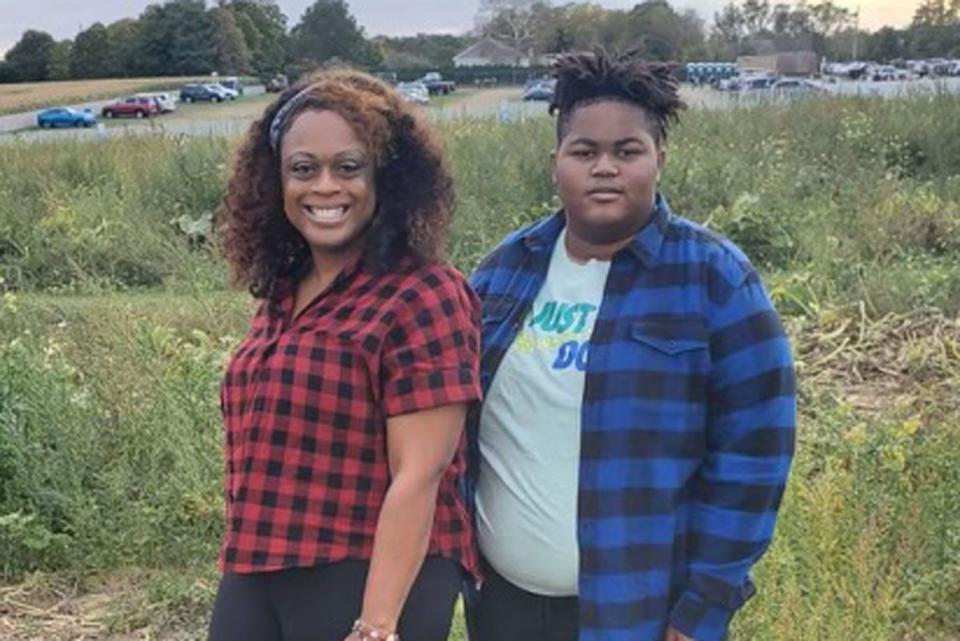 <p>Burns Charest LLP</p> Kevin Greenidge (L) with his mother Melissa Arzu