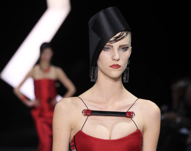 <b>Armani Prive SS13</b><br><br>Chunky embellishments added a dramatic twist to necklines.<br><br>©Reuters