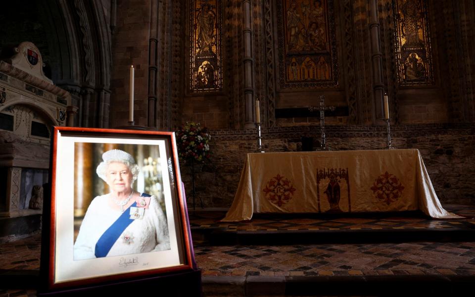 A portrait of Britain's Queen Elizabeth is displayed inside St Davids Cathedral