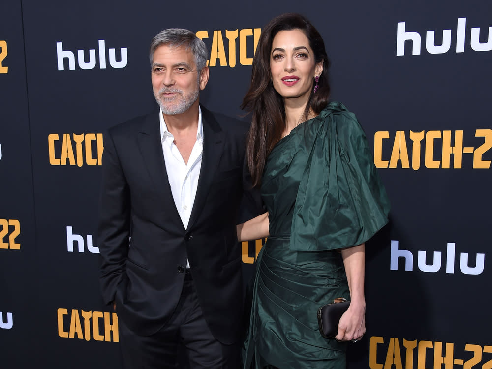 George und Amal Clooney auf einer Veranstaltung in Hollywood (Bild: DFree/Shutterstock.com)