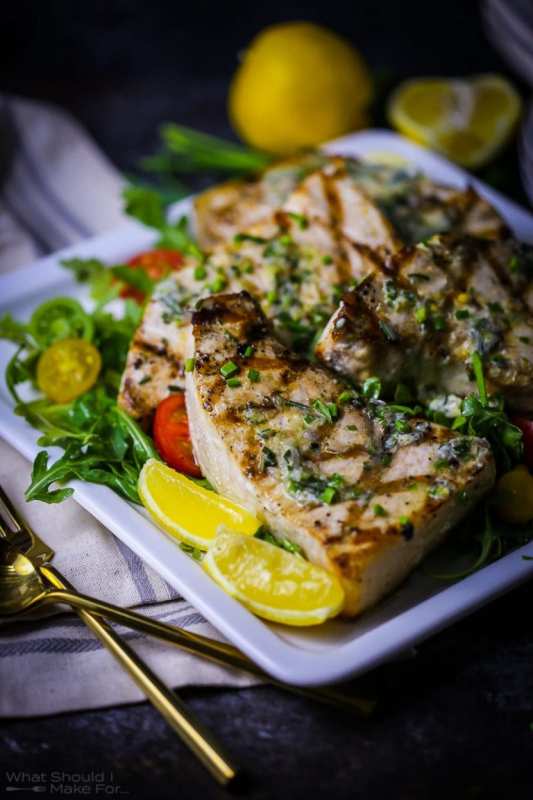 <p>What Should I Make For</p><p>This bright, herby butter is the perfect counter to this tender, meaty grilled swordfish. Bonus…the herb butter can be made and frozen so you can have it on hand for a quick dinner.</p><p><strong>Get the recipe: <a href="https://whatshouldimakefor.com/grilled-swordfish-with-herb-butter/" rel="nofollow noopener" target="_blank" data-ylk="slk:Grilled Swordfish with Herb Butter;elm:context_link;itc:0;sec:content-canvas" class="link rapid-noclick-resp">Grilled Swordfish with Herb Butter</a></strong></p><p><strong>Related: <a href="https://parade.com/1342450/kristamarshall/baked-fish-recipes/" rel="nofollow noopener" target="_blank" data-ylk="slk:40 Baked Fish Recipes;elm:context_link;itc:0;sec:content-canvas" class="link rapid-noclick-resp">40 Baked Fish Recipes</a></strong></p>