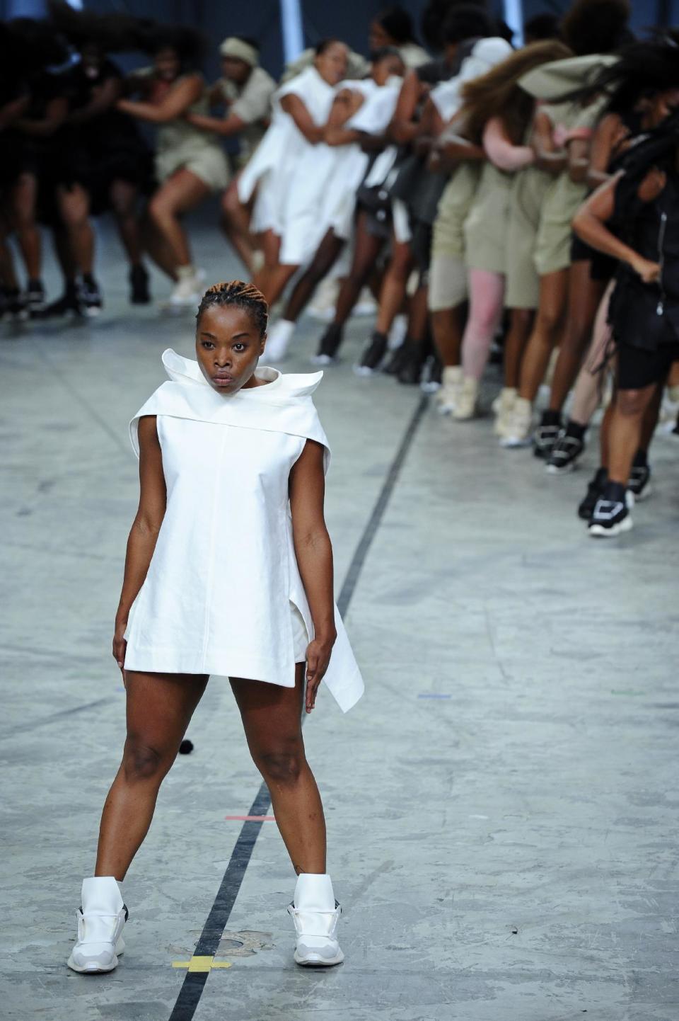 A model presents a creation as part of fashion designer Rick Owens' ready-to-wear Spring/Summer 2014 fashion collection presented in Paris, Thursday, Sept. 26, 2013. (AP Photo/Zacharie Scheurer)