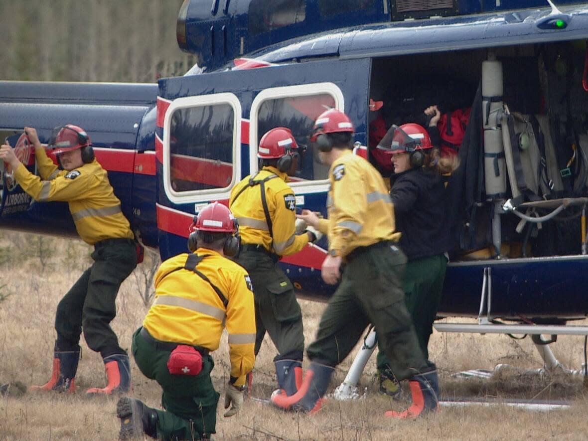 Alberta Wildfire recruits are seen during a training exercise in Hinton, Alta. More than 500 people have been trained for this wildfire season, which is already underway in the province. (Peter Evans/CBC - image credit)