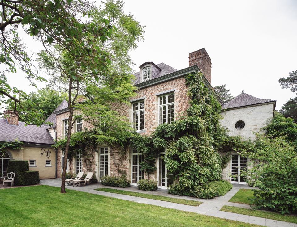 “In the spring the house is covered in beautiful blue flowers,” says Dankers of the wisteria vine that grows along the side.