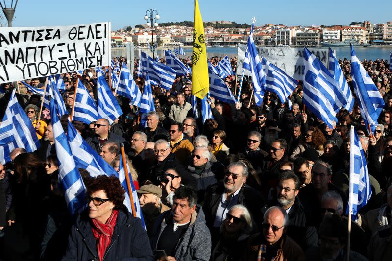 Locals take part in protest against overcrowded migrants camps on the island of Lesbos, in Mytilene