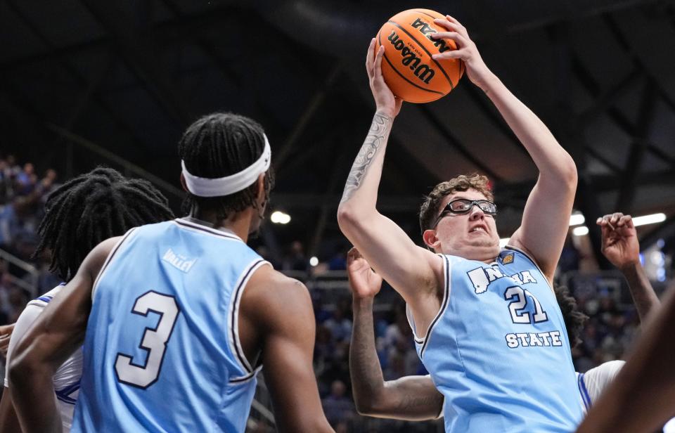 Indiana State Sycamores center Robbie Avila (21) recovers a rebound Thursday, April 4, 2024, during the NIT championship game at Hinkle Fieldhouse in Indianapolis.