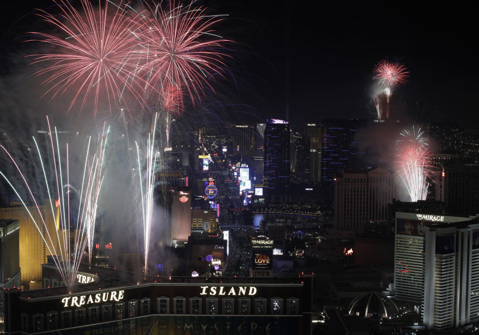 Fireworks explode over the Las Vegas Strip during a New Year’s Eve celebration Sunday, Jan. 1, 2017, in Las Vegas. (AP Photo/John Locher)