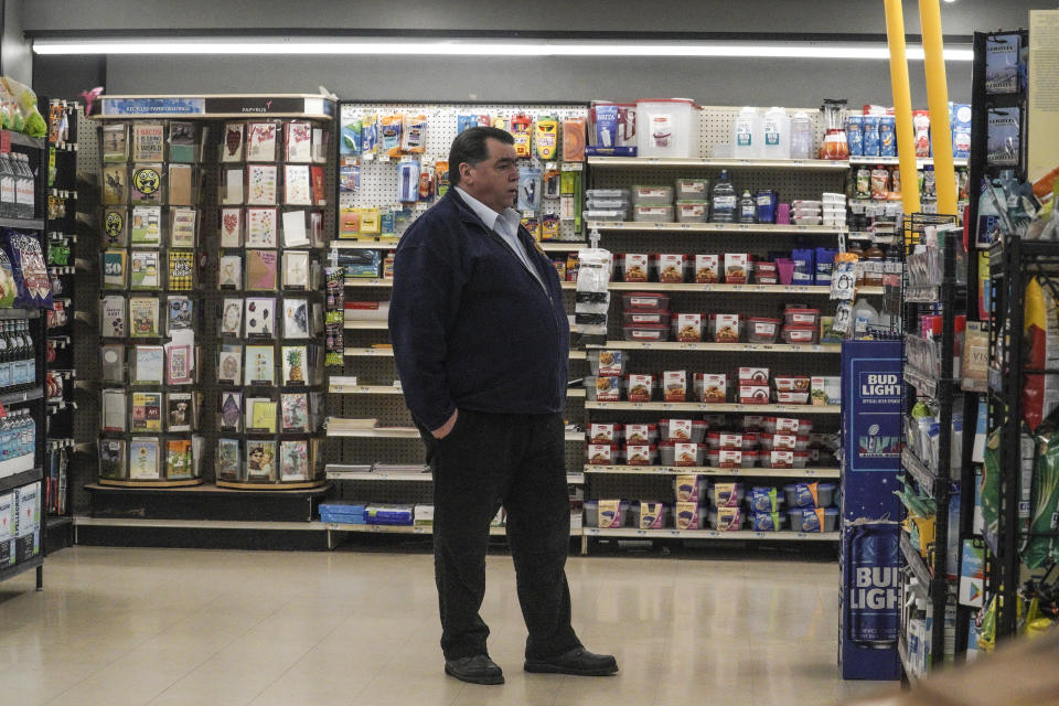 Matthew Calabrese, the head of security at several Gristedes supermarkets and a former NYPD officer, patrols isles in one of the stores, Tuesday Jan. 31, 2023, in New York. "This is a high priority store for theft," said Calabrese, who has either locked up or re-positioned goods to curtail theft. (AP Photo/Bebeto Matthews)