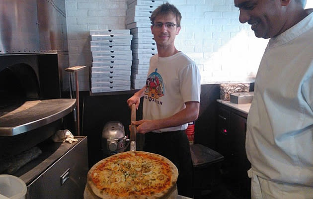 Martin helped out at Spizza on one of his tasks in Singapore. (Photo: Martin Pasquier)