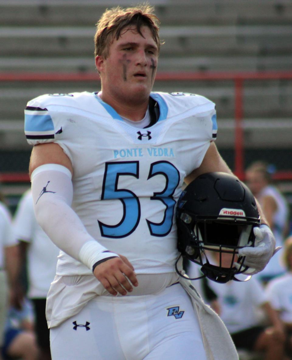 Ponte Vedra center Jake Guarnera walks to midfield for the coin toss before a high school football preseason kickoff classic at Mandarin on August 18, 2023. [Clayton Freeman/Florida Times-Union]