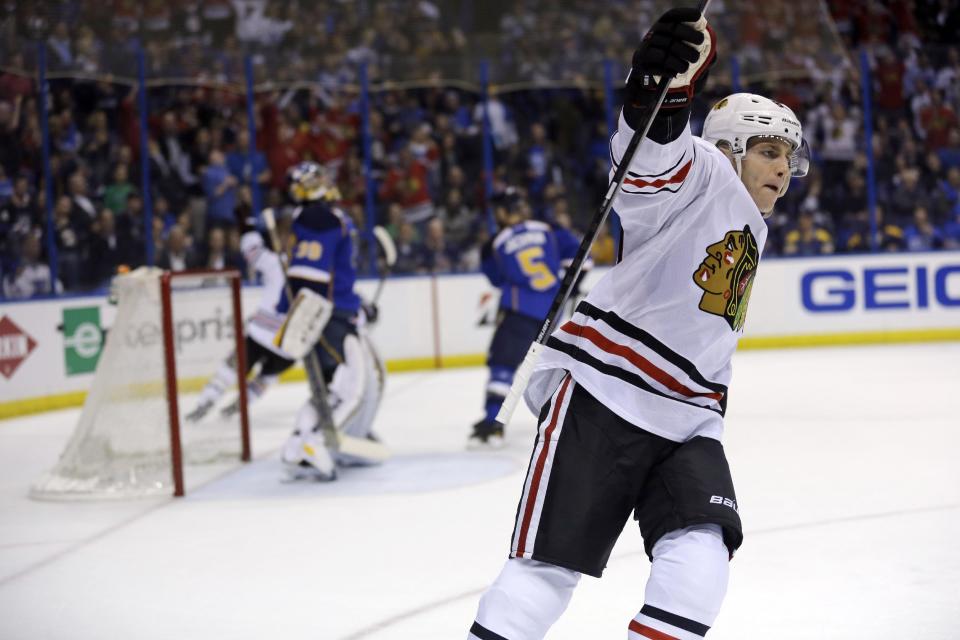 Chicago Blackhawks' Patrick Kane celebrates after scoring during the first period in Game 1 of a first-round NHL hockey Stanley Cup playoff series against the St. Louis Blues on Thursday, April 17, 2014, in St. Louis. (AP Photo/Jeff Roberson)