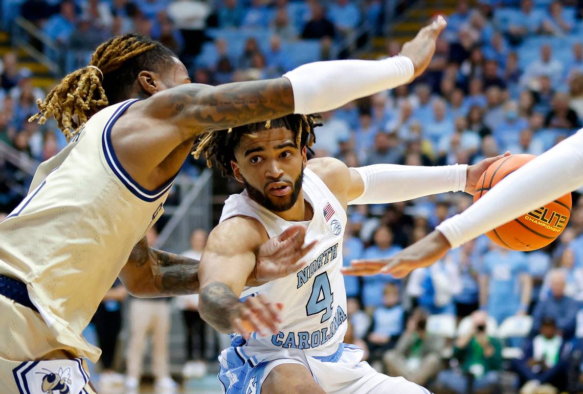 North Carolina’s R.J. Davis drives against Georgia Tech’s Deivon Smith during the first half of a men’s basketball game at the Dean E. Smith Center on Saturday, Dec. 10, 2022, in Chapel Hill, N.C.