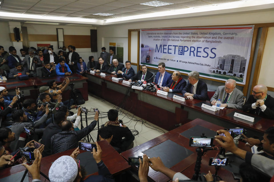 International election observers address a press conference at the National Press Club in Dhaka, Bangladesh, Monday, Jan.8, 2024. Prime Minister Sheikh Hasina has won an overwhelming majority in Bangladesh's parliamentary election after a campaign fraught with violence and a boycott from the main opposition party, giving her and her Awami League a fourth consecutive term. (AP Photo/Mahmud Hossain Opu)