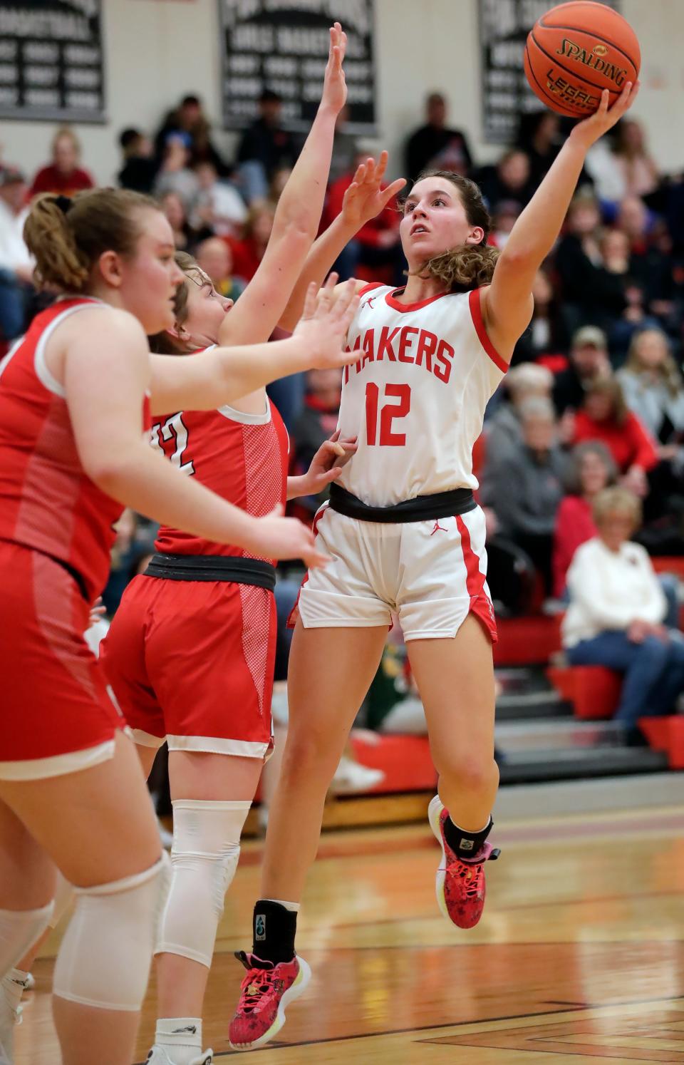 Kimberly's Kate McGinnis (12) has helped the Papermakers reach the top of the Fox Valley Association standings.
