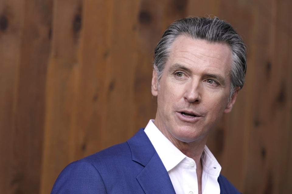 California Gov. Gavin Newsom said on Friday, Oct. 7, 2022, that he will call a special session of the state Legislature on Dec. 5, to pass a new tax on oil companies in response to high gas prices, while talking to reporters in Sacramento, Calif. (AP Photo/Rich Pedroncelli)