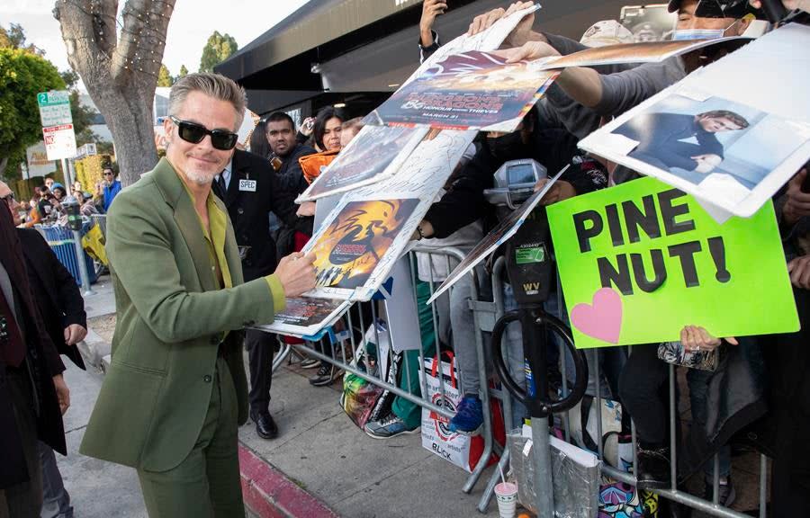 Chris Pine makes his fans very happy at the Los Angeles Premiere of Paramount Pictures’ and eOne’s “Dungeons & Dragons: Honor Among Thieves” at the Regency Village Theatre in Westwood. (Alex J. Berliner/ABImages)