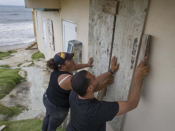 Puerto Rico residents board up their home ahead of Storm Dorian's arrival (Getty Images)