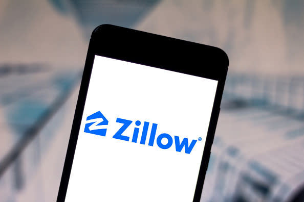 In this photo illustration, the Zillow Group logo is seen displayed on a smartphone.