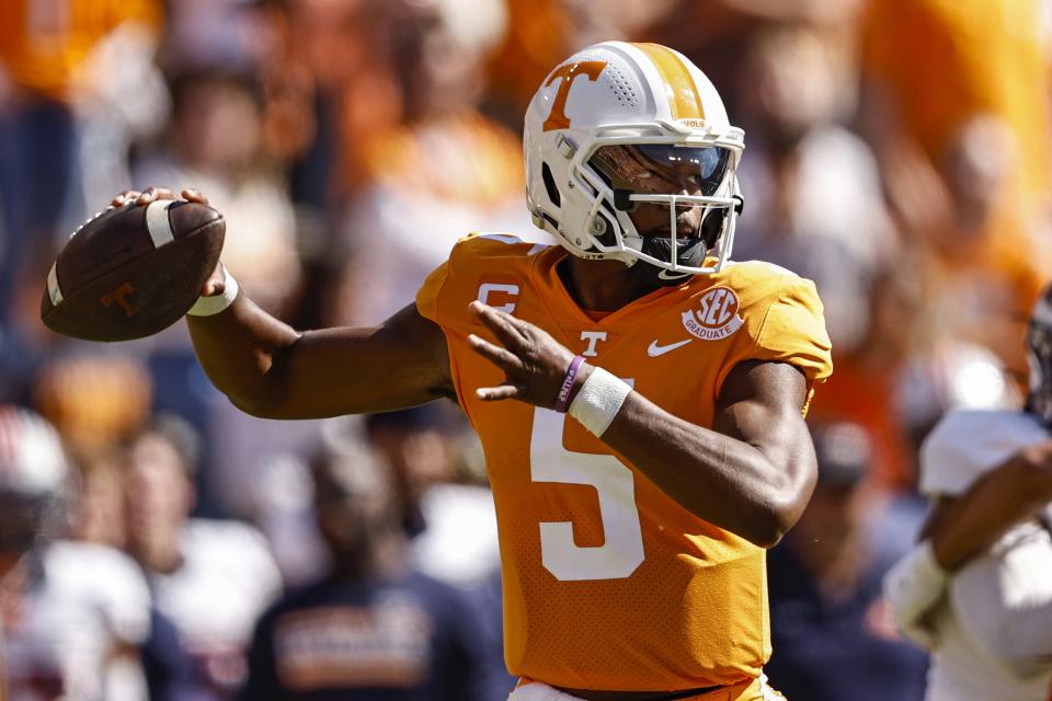 Tennessee quarterback Hendon Hooker (5) continues to see his Heisman odds improve as he and the Vols ar thriving. (AP Photo/Wade Payne)