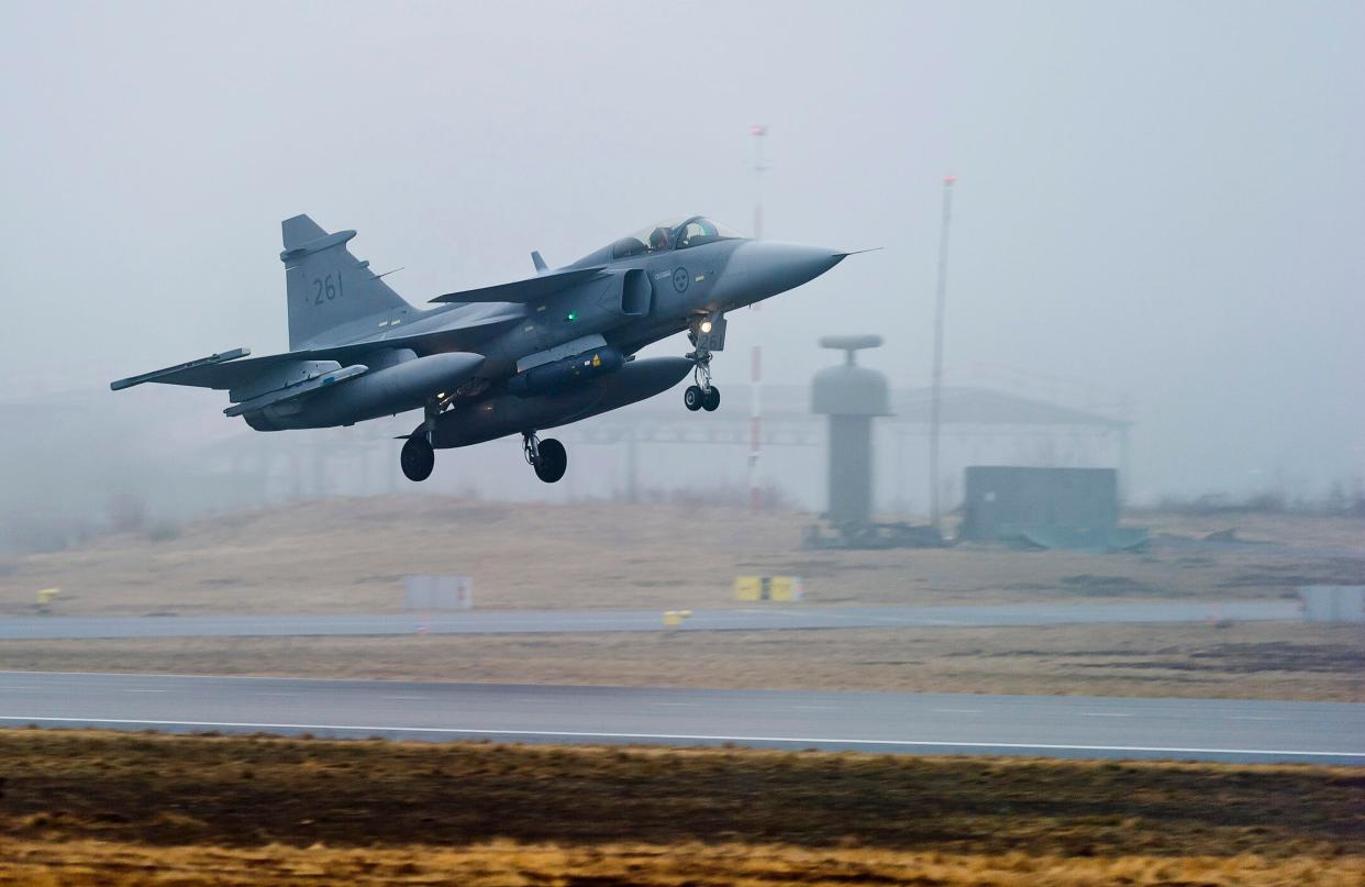 A Swedish Air Force JAS 39 Gripen fighter aircraft takes off from the Blekinge Wing F17, based in Kallinge