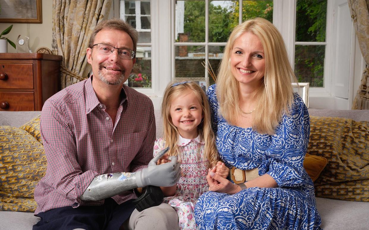 Craig Mackinlay with his wife Kati and daughter Olivia