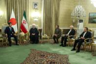 Iranian President Hassan Rouhani meets with Japan's Prime Minister Shinzo Abe, during in Tehran