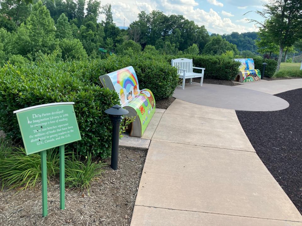 Painted benches at Dollywood's DreamMore Resort commemorating Dolly Parton's philanthropy.