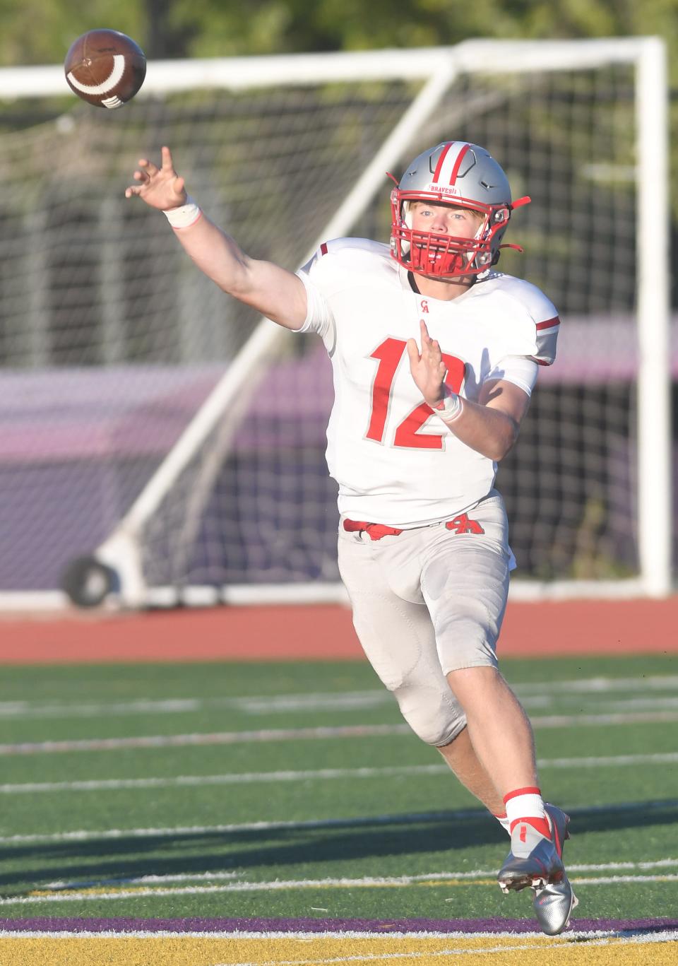 Canandaigua quarterback Drew Williamee delivers a pass in the first quarter.