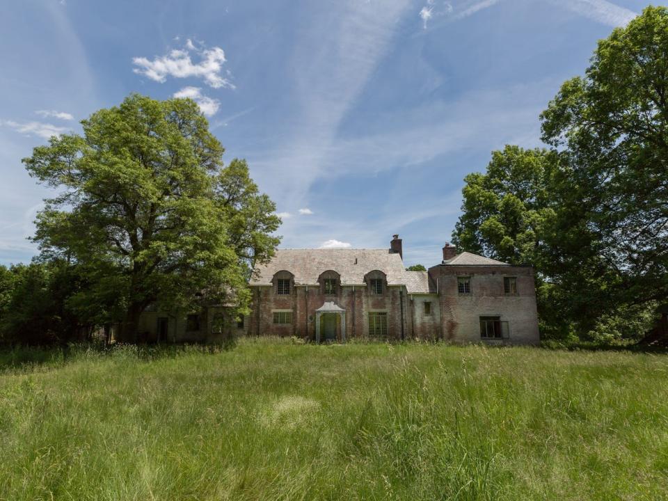 An exterior shot of the abandoned circus-themed house in the Catskills, New York.
