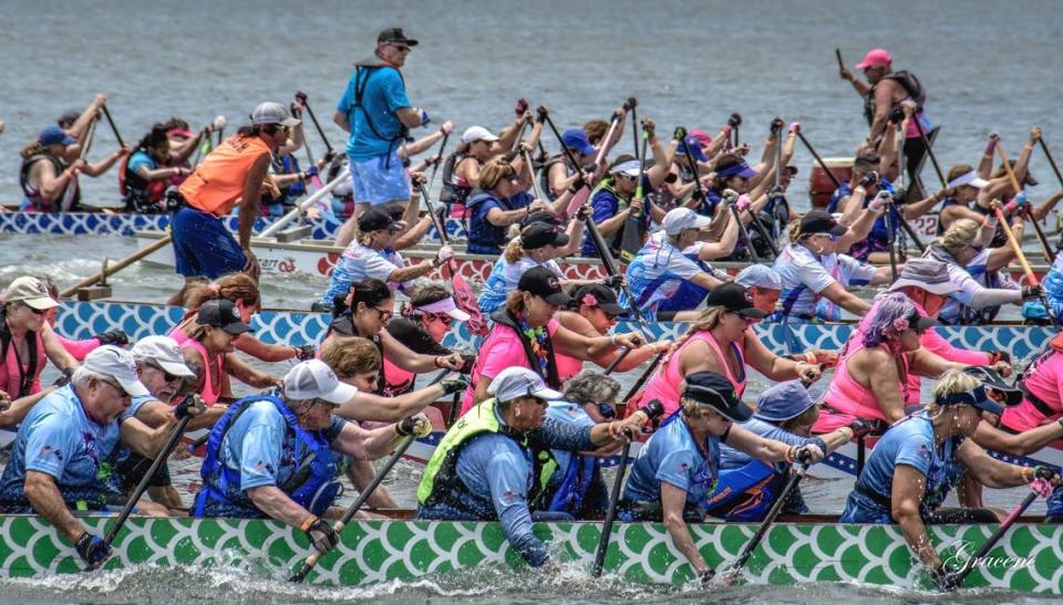 Dragon boats take off at the start of a race Saturday in Beaufort.