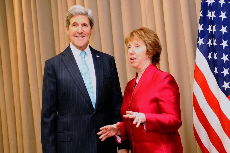 US Secretary of State John Kerry (L) and EU foreign policy chief Catherine Ashton before a meeting on April 17, 2014 in Geneva