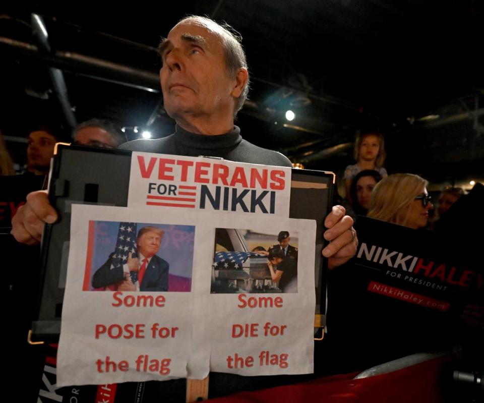 John Diehl of Cornelius, NC stands along the railing waiting for the Nikki Haley rally to begin at Norfolk Hall at Suffolk Punch in SouthEnd on Friday, March 1, 2024 in Charlotte, NC. JEFF SINER/jsiner@charlotteobserver.com