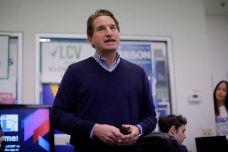 U.S. Democratic congressional candidate Dean Phillips encourages campaign volunteers at a Democratic-Farmer-Labor Party office in Plymouth, Minnesota, U.S., October 27, 2018. Picture taken October 27, 2018. REUTERS/Brian Snyder